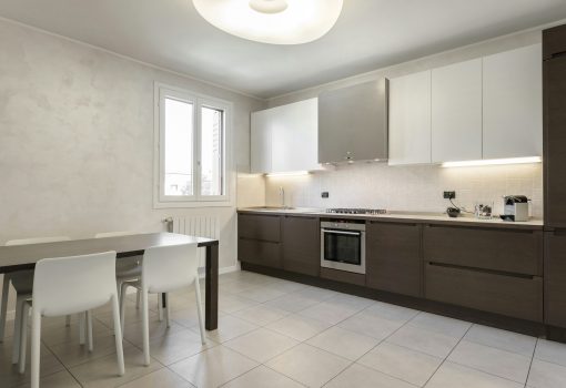 Spacious apartment. Living room and kitchen in modern house. Modern stylish interior design.